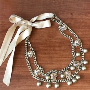 Statement necklace with ribbon tie